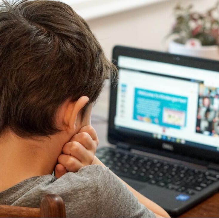 Boy in front of computer